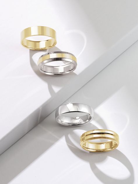 Men's wedding bands in different widths, metals and finishes